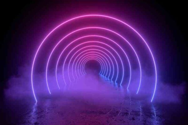 A series of luminous, pink, and Lilac Diesel #22 Multipack (F) concentric arches create a glowing tunnel effect against a dark background with fog at the base.