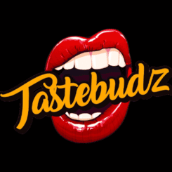 Logo featuring a set of lips with white teeth, partially open, with the word "Tastebudz" written across in bold, cursive lettering.